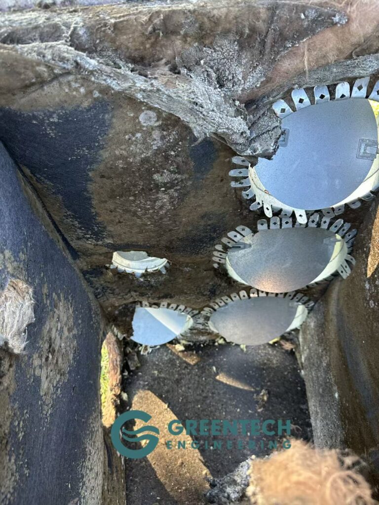 Deteriorated insulation and airflow blockage found inside plenum box in Sachse HVAC project