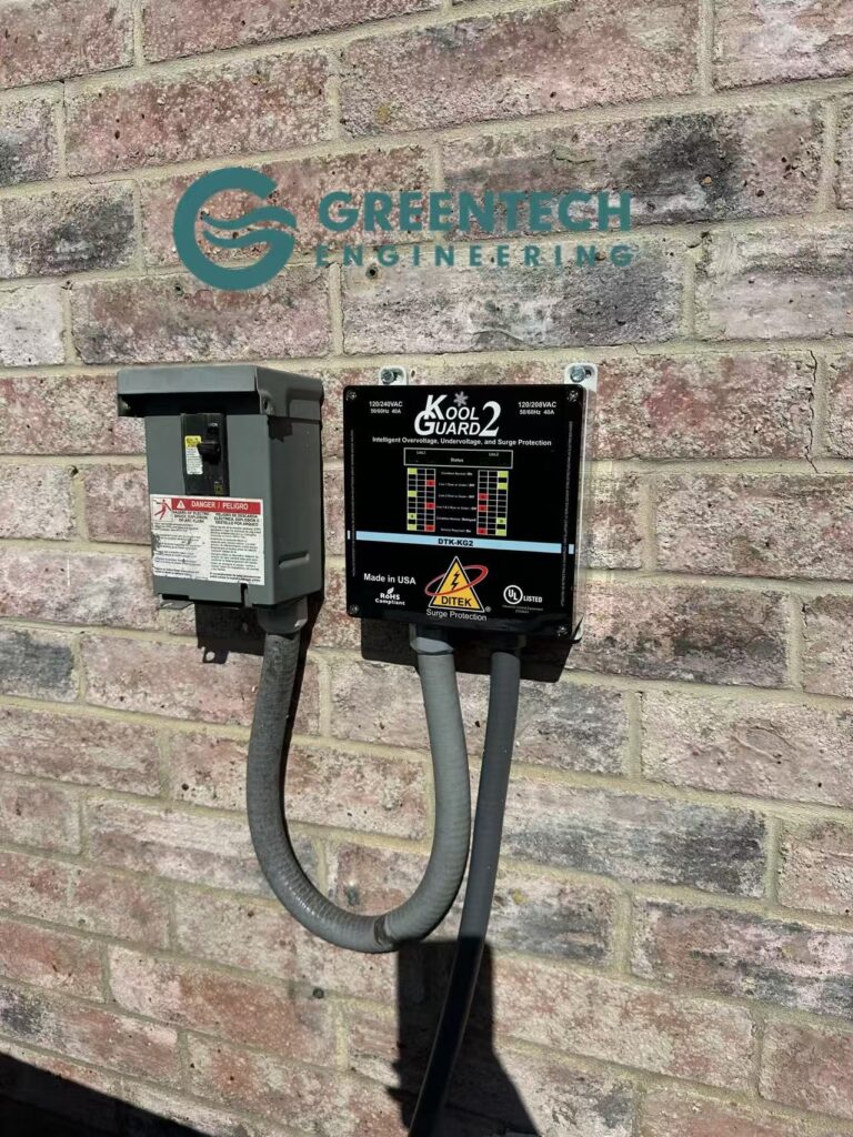 Close-up of Kool Guard HVAC voltage protector used for Daikin Fit system protection